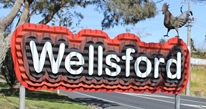 The Wellsford sign near the entry to Wellsford, state highway 1 Wellsford image
